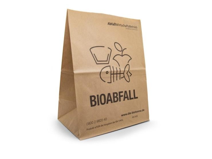 Biobeutel aus Papier Ein brauner Papierbeutel mit Aufdruck Bioabfall