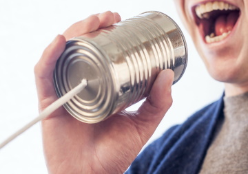 Kommunikation über ein Dosentelefon
